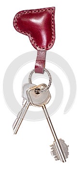 Two door keys on leather heart shaped key fob