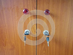 Two doors with keys, background