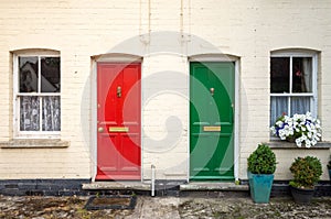 Two doors, a red one and a green
