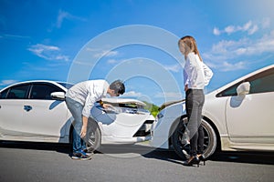 Two Drivers arguing after a car accident