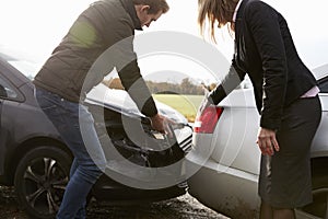 Two Drivers Arguing Over Damage To Cars After Accident