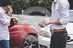 Two drivers man arguing after a car traffic accident collision and making phone call to Insurance Agent, Traffic Accident and