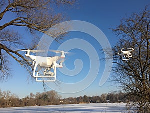 Two drones flying on the sky