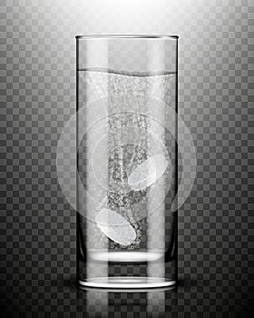 Two effervescent tablets in glass of water