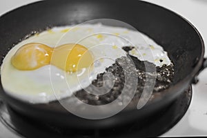 Two egg yolk sunny side up fry up in pan