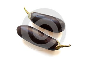 Two eggplants on white background