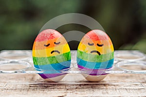 Two eggs are colored in the colors of the rainbow as a flag of gays and lesbians as well as Easter eggs. Homosexual concept