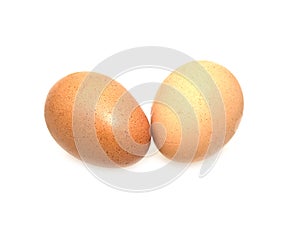 Two eggs are isolated on a white background