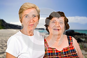 Two elderly women on a beach