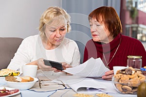 Two elderly women faced financials troubles