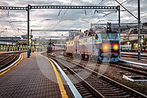 Two electric locomotive moving down a railway line