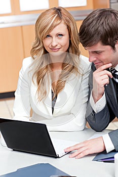 Two elegant businesspeople working