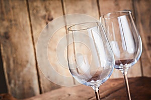 Two elegant wineglasses with remnants of wine