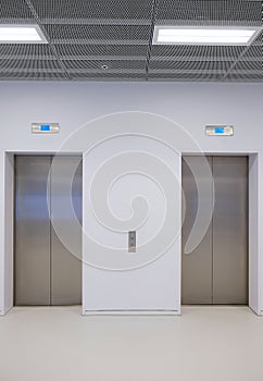 Two elevators in a modern building