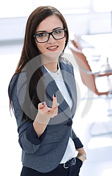 Two employees talking standing in the office