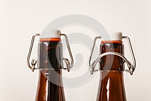 Two empty Brown bottles with lids