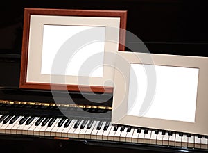Two empty frames on piano