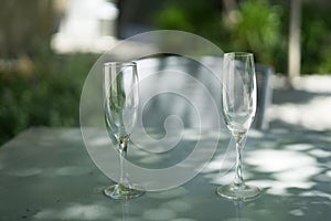 Two empty glass wine cups