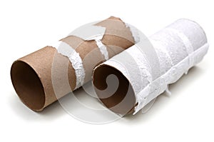 Two empty toilet rolls on white background