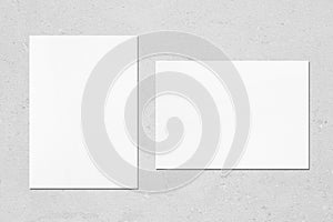 Two empty white vertical and horizontal rectangle poster mockups