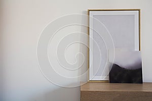 Two empty wooden frame mockup. Interior poster design on white wall scandanavian design
