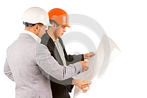 Two engineers or architects discussing a plan