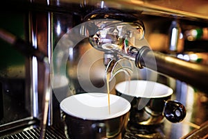 espresso pouring from espresso coffee machine. Hot beverages