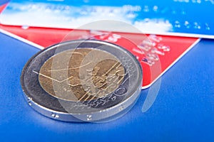 Two euro coin and credit cards