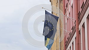 Two European flags on the building of the Consulate General of Sweden, St. Petersburg