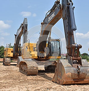 Excavators lined up in a row