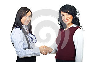 Two executives women shaking hands