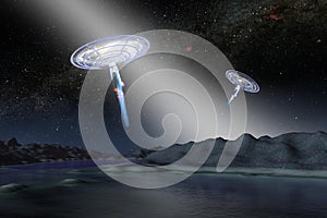 Two extraterrestrial alien spaceships ufo with spotlights above the earth landscape.