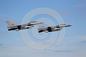 Two f-16 Fighter Jets in formation