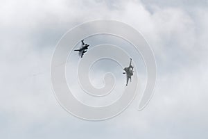Two F16 fighter jet over clouds photo