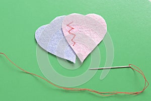 two fabric hearts sewn together