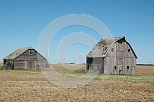 Two Faded Barns in Nebraska