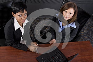 Two female business