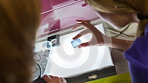 Two Female Dentist Looking At X-ray Image
