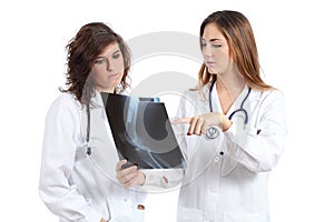 Two female doctors watching a radiography photo
