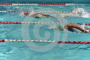 Two female freestyle swimmers