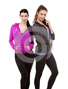 Two female friends on white background