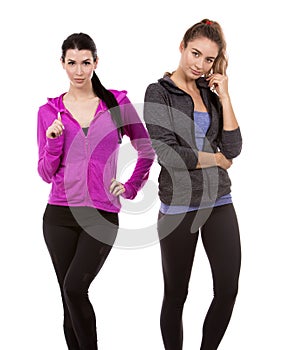 Two female friends on white background