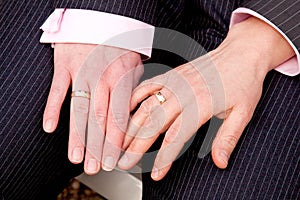 Two female hands with wedding rings