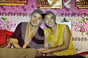 Two female monks smiling