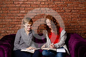 Two female students doing homework together