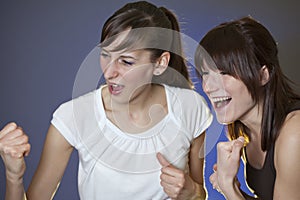 Two females cheer