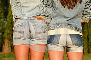 Two females in jeanswear