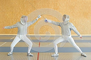 Two fencers in joust photo