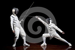 Two fencers sparring