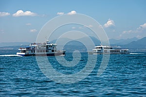 Two Ferry Boats in front of the Bardolino village - Lake Garda Italy